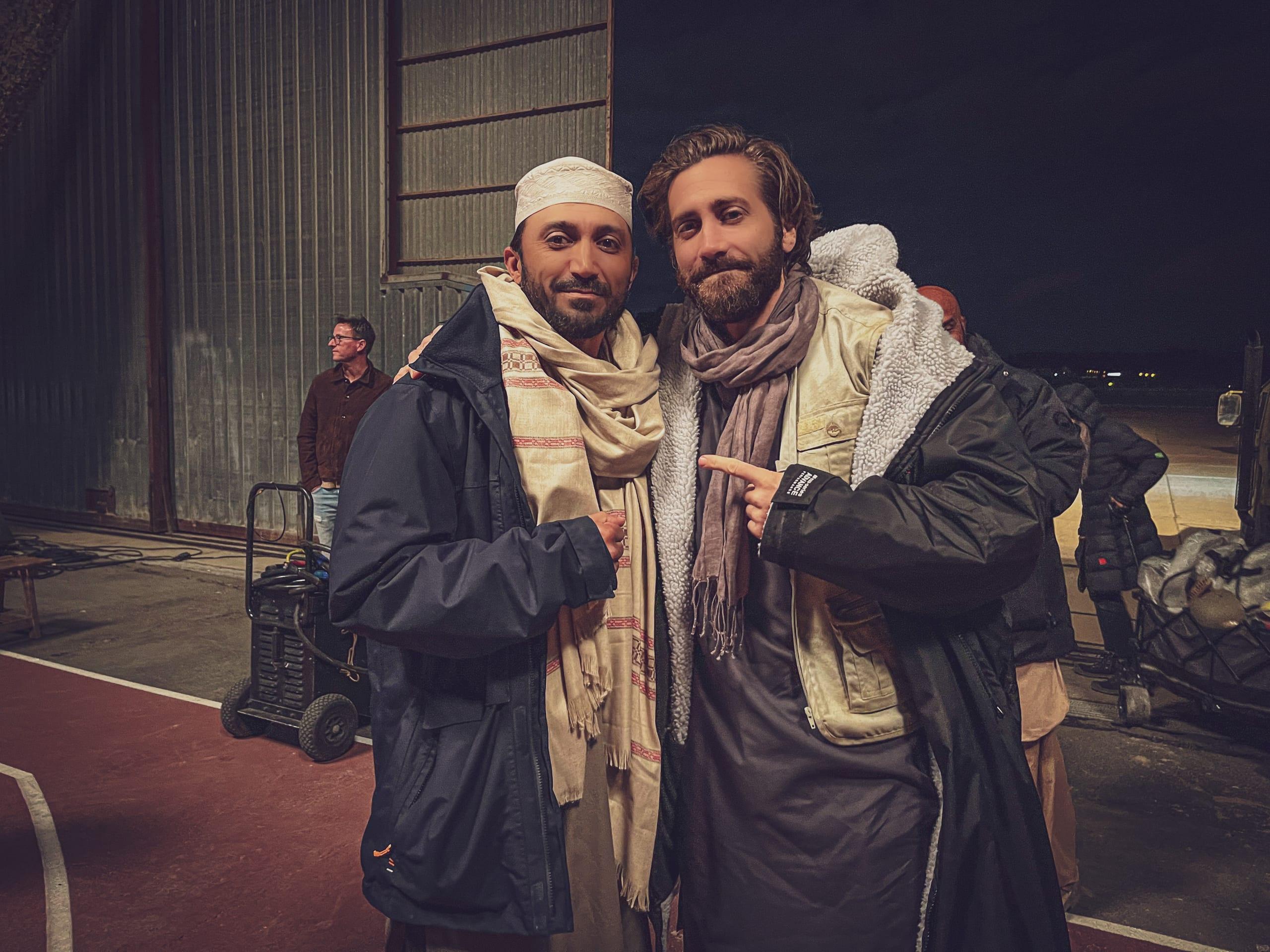 Kawa Mawlayee with a lead actor on set between takes